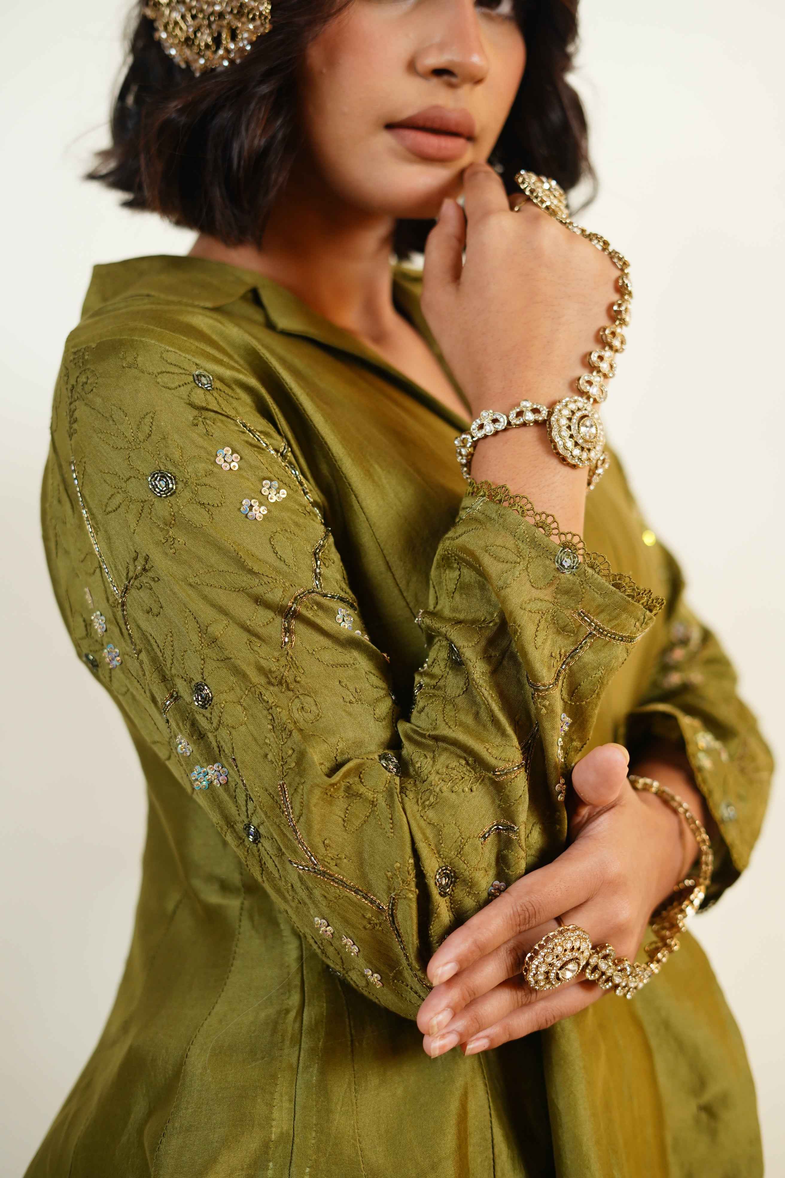 Hoor-Deep Olive green chikankari and zardozi handcraftrd caot collar asymmetrical palazzo set